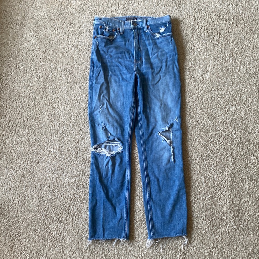 Ripped blue jeans